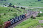 A westbound ballast train approaches West End Siding 